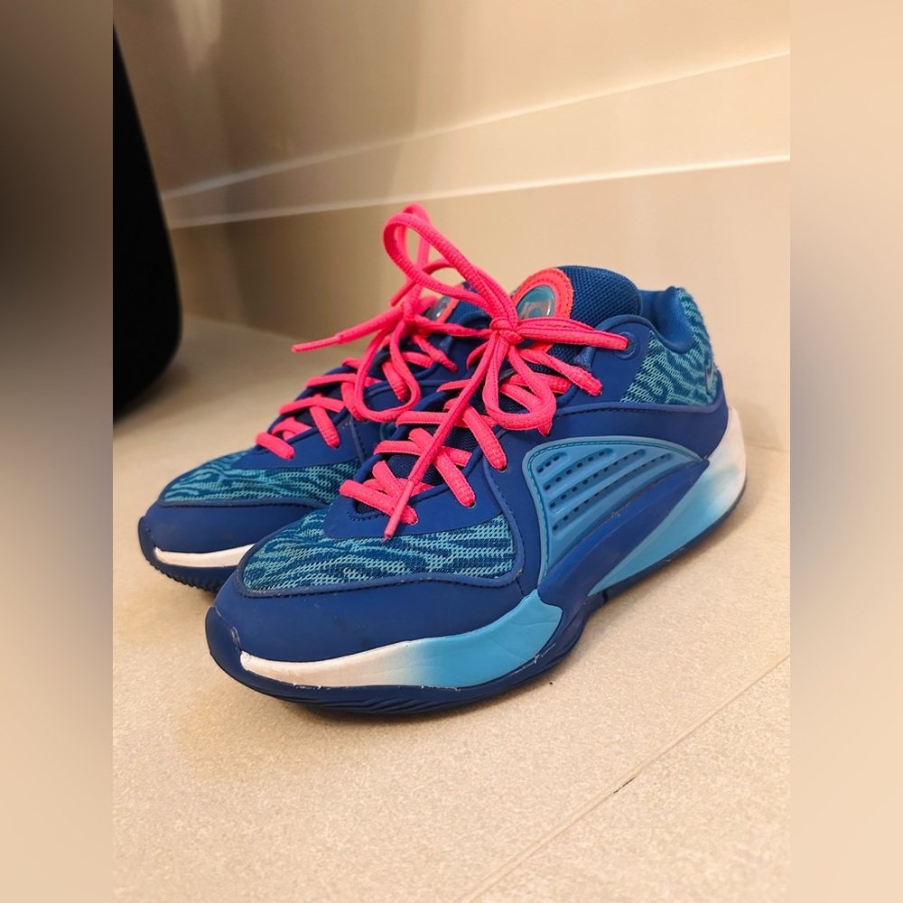 Vibrant Blue Sneakers with Pink Accents